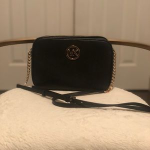 Black and gold Michael Kors crossbody bag